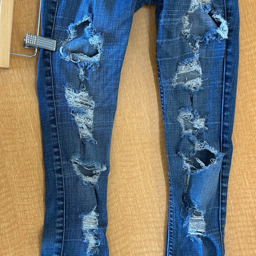 Distressed Blue Jeans